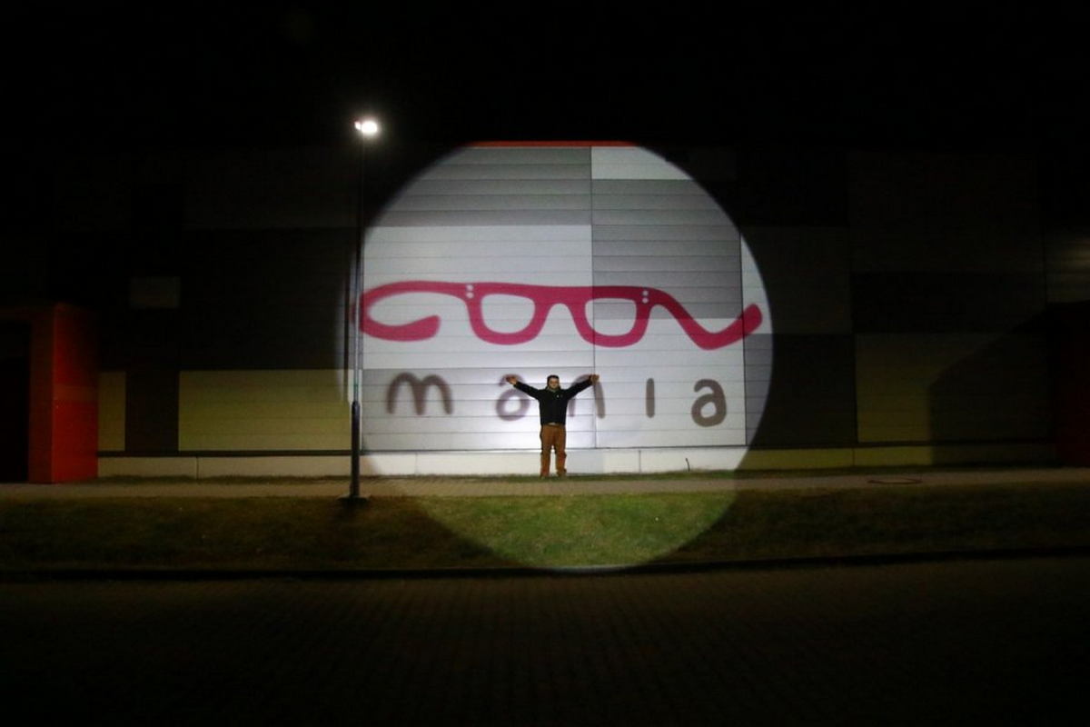 GOBO projectors - logo projection on the wall of a building
